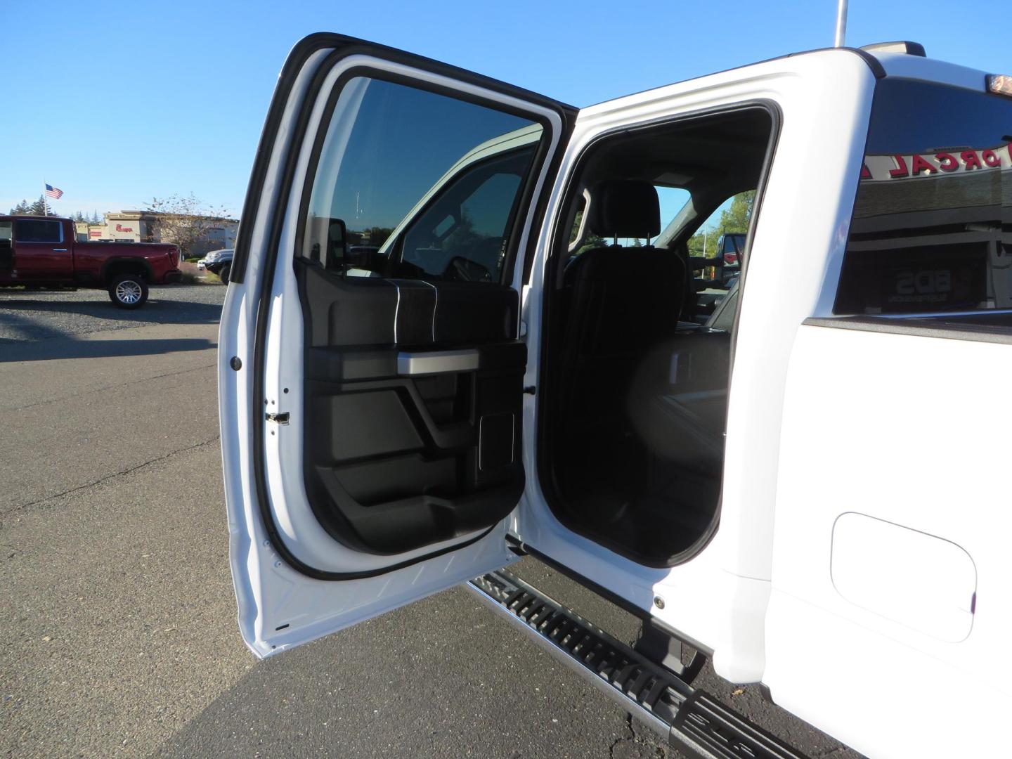 2021 White /BLACK Ford F-250 SD Lariat Crew Cab 4WD (1FT7W2BTXME) with an 6.7L V8 OHV 16V DIESEL engine, 6A transmission, located at 2630 Grass Valley Highway, Auburn, CA, 95603, (530) 508-5100, 38.937893, -121.095482 - Features a BDS level kit with Fox 2.0 shocks, 35" Toyo Open Country RT trail tires, 18" KMC IMS wheels, Weathertech Bug deflector and floor liners. - Photo#40