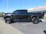 2021 BLACK /BLACK GMC Sierra 2500HD AT4 Crew Cab 4WD (1GT49PEY3MF) with an 6.6L V8 OHV 16 DIESEL engine, 6A transmission, located at 2630 Grass Valley Highway, Auburn, CA, 95603, (530) 508-5100, 38.937893, -121.095482 - Features a RC 7'' suspension system, 37'' Nitto Ridge Grappler tires, 22'' 4 Play wheels, Airlift helper bags with compressor, soft folding tonneau cover, and window tint. - Photo#1