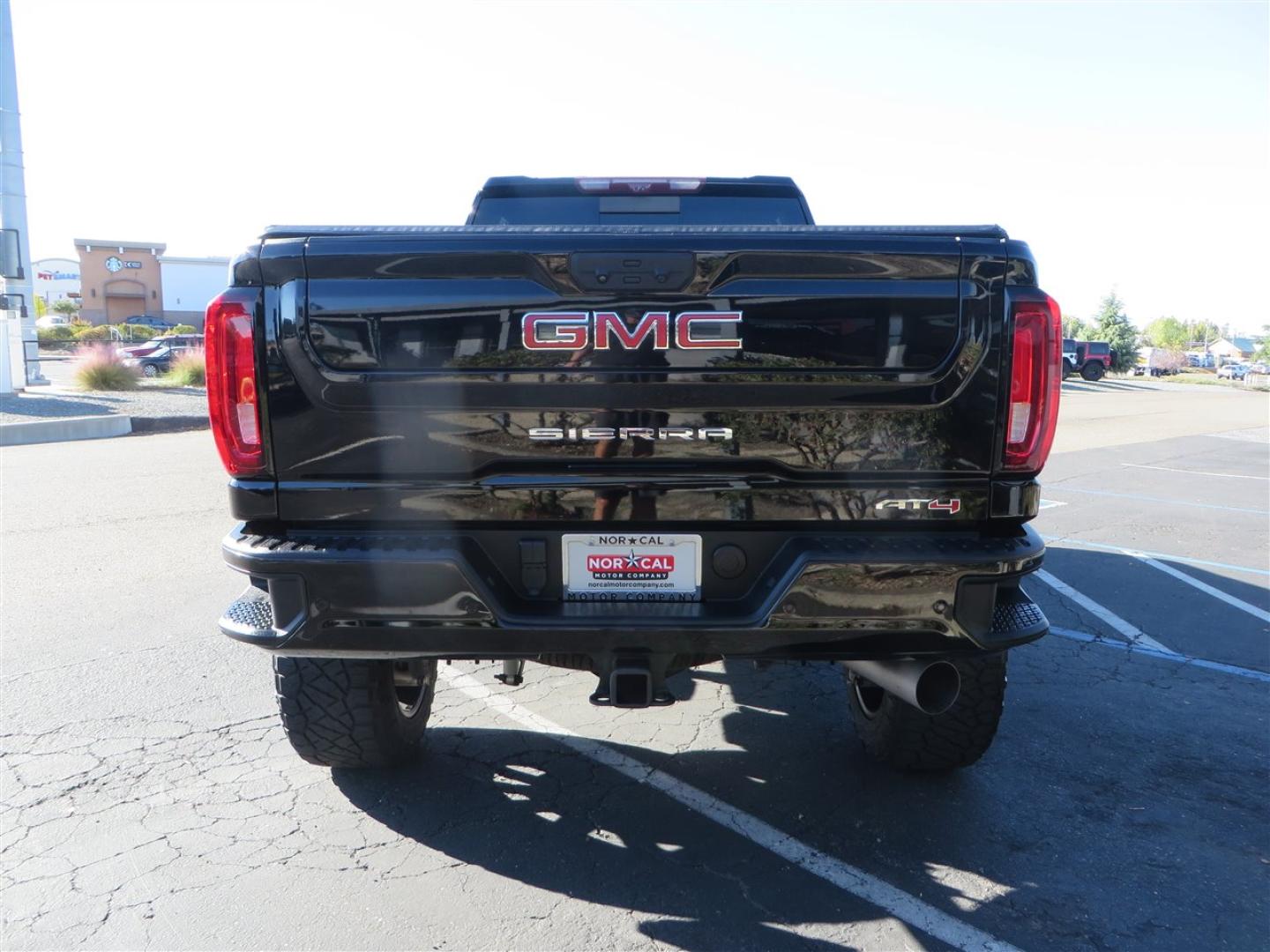 2021 BLACK /BLACK GMC Sierra 2500HD AT4 Crew Cab 4WD (1GT49PEY3MF) with an 6.6L V8 OHV 16 DIESEL engine, 6A transmission, located at 2630 Grass Valley Highway, Auburn, CA, 95603, (530) 508-5100, 38.937893, -121.095482 - Features a RC 7'' suspension system, 37'' Nitto Ridge Grappler tires, 22'' 4 Play wheels, Airlift helper bags with compressor, soft folding tonneau cover, and window tint. - Photo#3