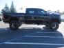 2021 BLACK /BLACK GMC Sierra 2500HD AT4 Crew Cab 4WD (1GT49PEY3MF) with an 6.6L V8 OHV 16 DIESEL engine, 6A transmission, located at 2630 Grass Valley Highway, Auburn, CA, 95603, (530) 508-5100, 38.937893, -121.095482 - Features a RC 7'' suspension system, 37'' Nitto Ridge Grappler tires, 22'' 4 Play wheels, Airlift helper bags with compressor, soft folding tonneau cover, and window tint. - Photo#5