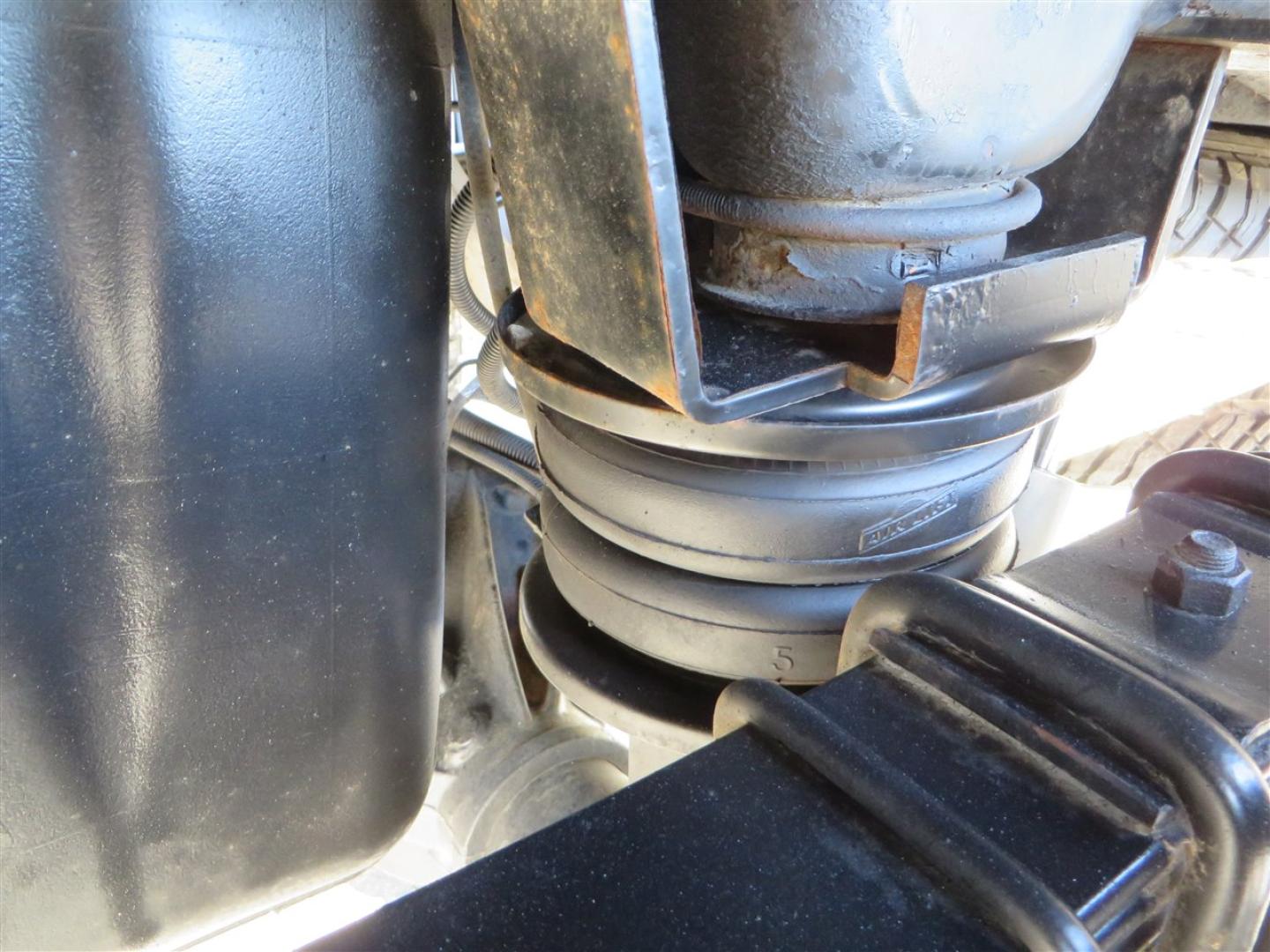 2021 BLACK /BLACK GMC Sierra 2500HD AT4 Crew Cab 4WD (1GT49PEY3MF) with an 6.6L V8 OHV 16 DIESEL engine, 6A transmission, located at 2630 Grass Valley Highway, Auburn, CA, 95603, (530) 508-5100, 38.937893, -121.095482 - Features a RC 7'' suspension system, 37'' Nitto Ridge Grappler tires, 22'' 4 Play wheels, Airlift helper bags with compressor, soft folding tonneau cover, and window tint. - Photo#12