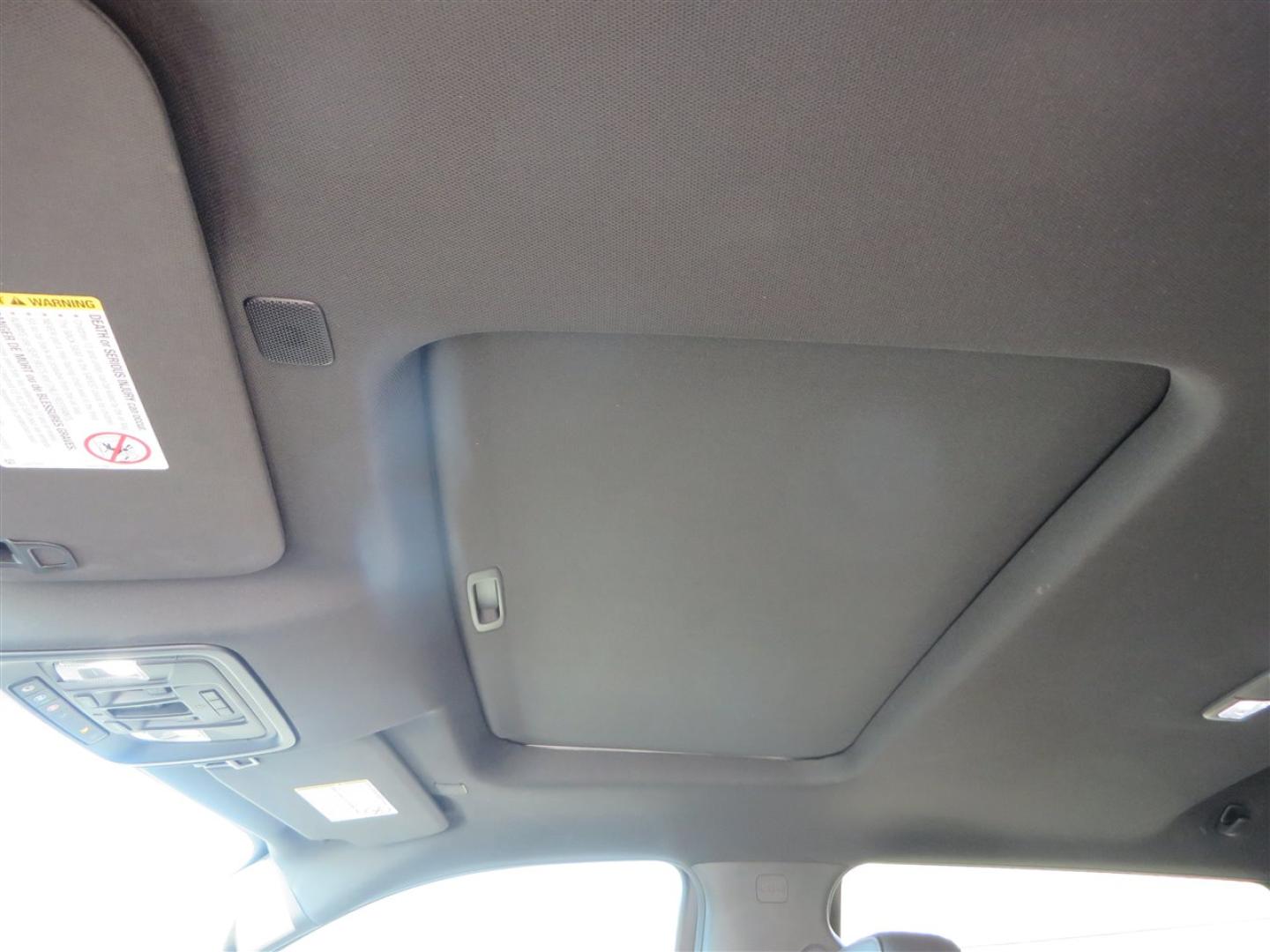 2021 BLACK /BLACK GMC Sierra 2500HD AT4 Crew Cab 4WD (1GT49PEY3MF) with an 6.6L V8 OHV 16 DIESEL engine, 6A transmission, located at 2630 Grass Valley Highway, Auburn, CA, 95603, (530) 508-5100, 38.937893, -121.095482 - Features a RC 7'' suspension system, 37'' Nitto Ridge Grappler tires, 22'' 4 Play wheels, Airlift helper bags with compressor, soft folding tonneau cover, and window tint. - Photo#28