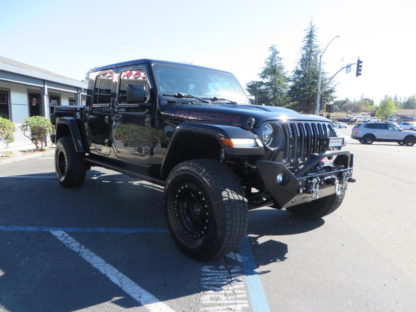 2021 BLACK /BLACK Jeep Gladiator Rubicon (1C6JJTBG1ML) with an 3.6L V6 DOHC 24V engine, automatic transmission, located at 2630 Grass Valley Highway, Auburn, CA, 95603, (530) 508-5100, 38.937893, -121.095482 - Mopar lifted Rubicon with Fox shocks, 17" Black Rhino Kelso wheels, 35" Nitto Terra Grappler G2 tires, AMP power steps, Rock Hard 4x4 front bumper, Warn Winch, 10" Rigid light bar, Bakflip MX4, and a Btech UV-5100 radio. - Photo#6