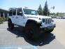 2021 White /Black Jeep Wrangler Unlimited Rubicon 4XE (1C4JJXR64MW) with an 2.0L L4 DOHC 16V HYBRID engine, 8A transmission, located at 2630 Grass Valley Highway, Auburn, CA, 95603, (530) 508-5100, 38.937893, -121.095482 - Mopar lifted JL with 17" Black Rhino Kelso wheels, 37" Toyo RT Trail tires, and a Teraflex HD tire relocation. - Photo#2