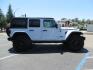 2021 White /Black Jeep Wrangler Unlimited Rubicon 4XE (1C4JJXR64MW) with an 2.0L L4 DOHC 16V HYBRID engine, 8A transmission, located at 2630 Grass Valley Highway, Auburn, CA, 95603, (530) 508-5100, 38.937893, -121.095482 - Mopar lifted JL with 17" Black Rhino Kelso wheels, 37" Toyo RT Trail tires, and a Teraflex HD tire relocation. - Photo#3