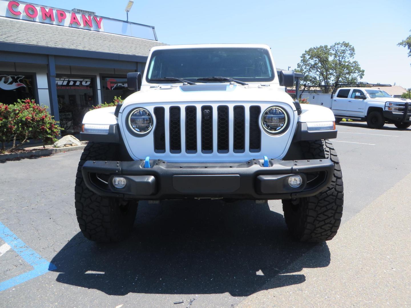 2021 White /Black Jeep Wrangler Unlimited Rubicon 4XE (1C4JJXR64MW) with an 2.0L L4 DOHC 16V HYBRID engine, 8A transmission, located at 2630 Grass Valley Highway, Auburn, CA, 95603, (530) 508-5100, 38.937893, -121.095482 - Mopar lifted JL with 17" Black Rhino Kelso wheels, 37" Toyo RT Trail tires, and a Teraflex HD tire relocation. - Photo#1