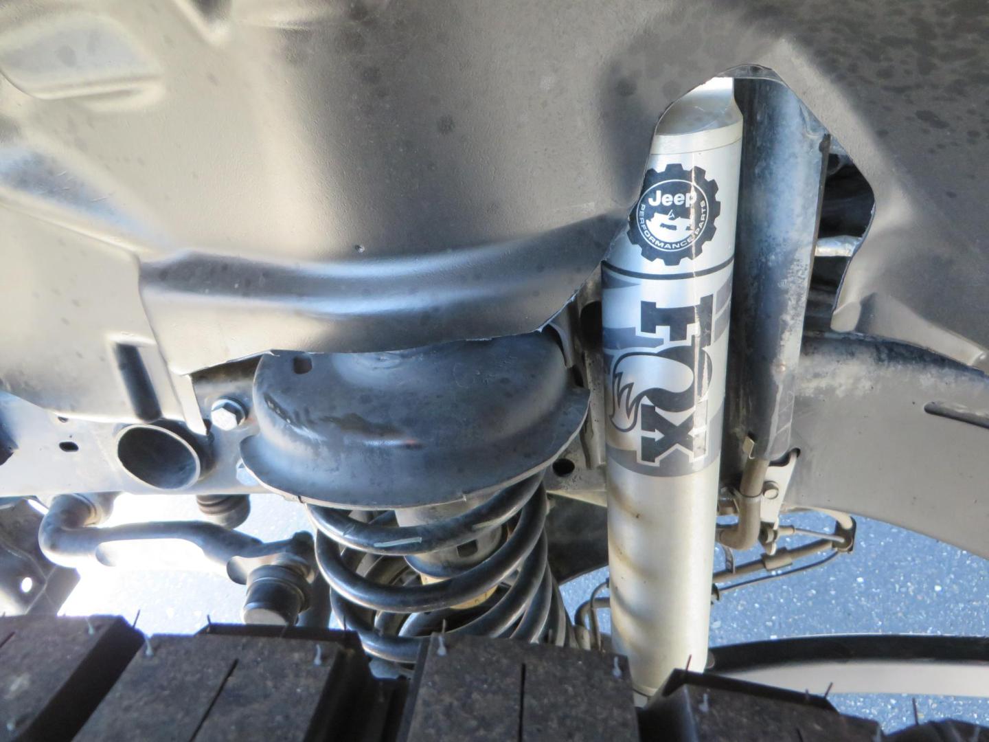 2021 White /Black Jeep Wrangler Unlimited Rubicon 4XE (1C4JJXR64MW) with an 2.0L L4 DOHC 16V HYBRID engine, 8A transmission, located at 2630 Grass Valley Highway, Auburn, CA, 95603, (530) 508-5100, 38.937893, -121.095482 - Mopar lifted JL with 17" Black Rhino Kelso wheels, 37" Toyo RT Trail tires, and a Teraflex HD tire relocation. - Photo#10