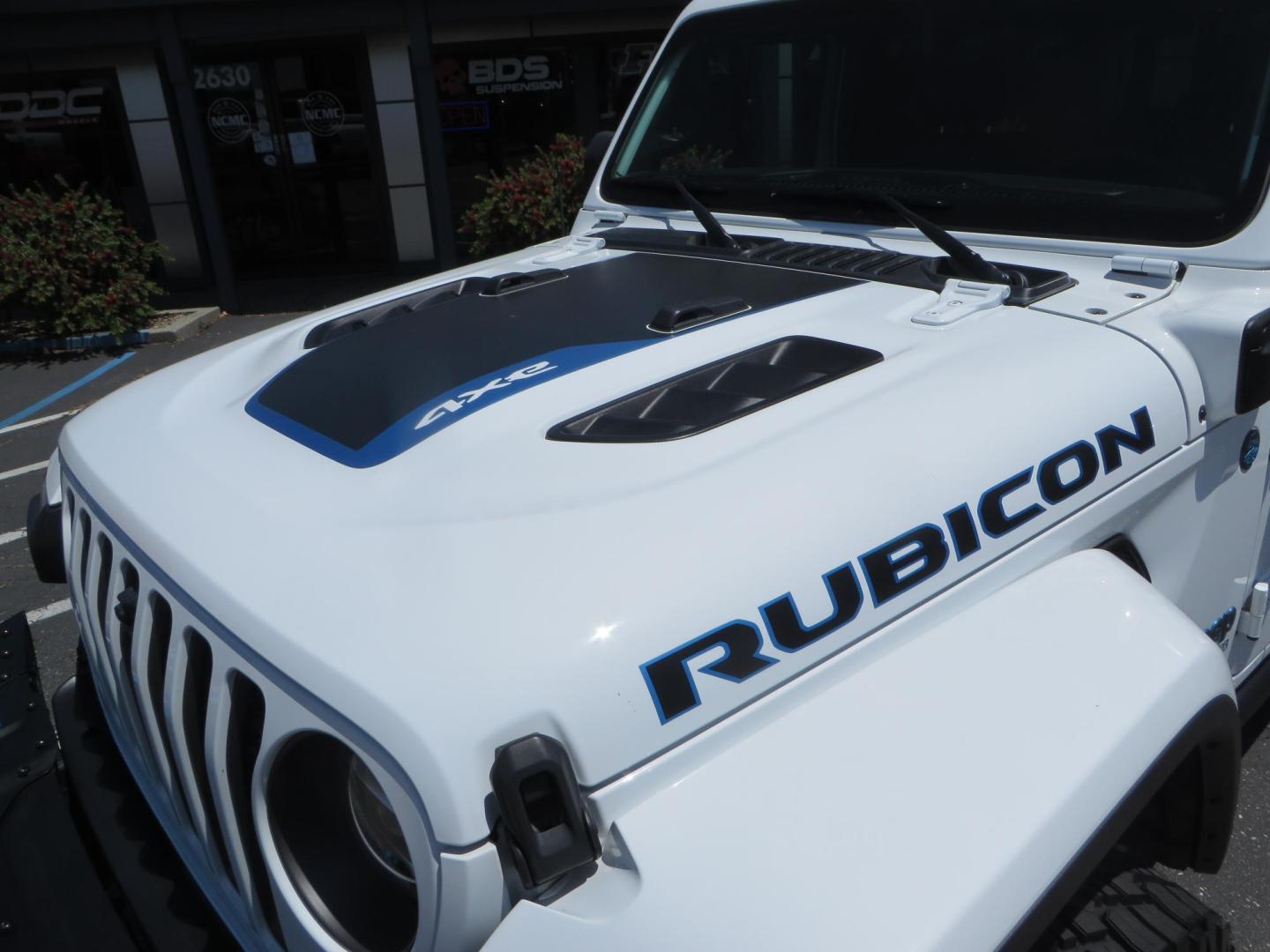 2021 White /Black Jeep Wrangler Unlimited Rubicon 4XE (1C4JJXR64MW) with an 2.0L L4 DOHC 16V HYBRID engine, 8A transmission, located at 2630 Grass Valley Highway, Auburn, CA, 95603, (530) 508-5100, 38.937893, -121.095482 - Mopar lifted JL with 17" Black Rhino Kelso wheels, 37" Toyo RT Trail tires, and a Teraflex HD tire relocation. - Photo#11