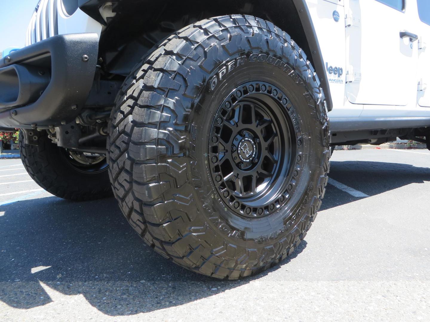 2021 White /Black Jeep Wrangler Unlimited Rubicon 4XE (1C4JJXR64MW) with an 2.0L L4 DOHC 16V HYBRID engine, 8A transmission, located at 2630 Grass Valley Highway, Auburn, CA, 95603, (530) 508-5100, 38.937893, -121.095482 - Mopar lifted JL with 17" Black Rhino Kelso wheels, 37" Toyo RT Trail tires, and a Teraflex HD tire relocation. - Photo#9