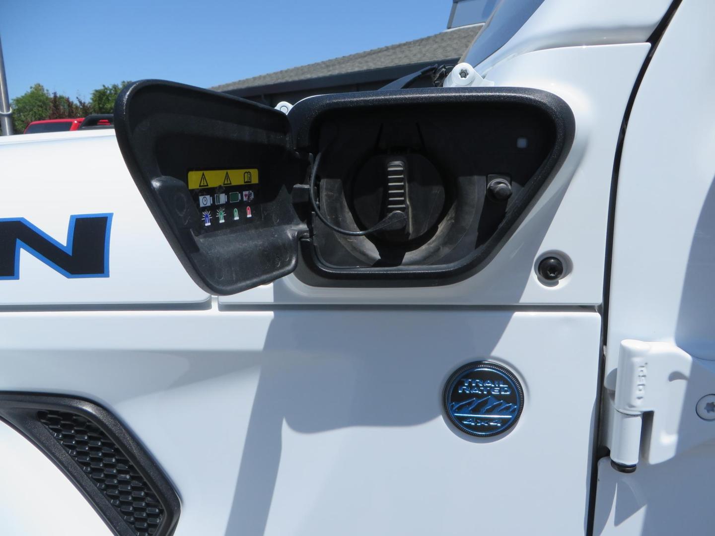 2021 White /Black Jeep Wrangler Unlimited Rubicon 4XE (1C4JJXR64MW) with an 2.0L L4 DOHC 16V HYBRID engine, 8A transmission, located at 2630 Grass Valley Highway, Auburn, CA, 95603, (530) 508-5100, 38.937893, -121.095482 - Mopar lifted JL with 17" Black Rhino Kelso wheels, 37" Toyo RT Trail tires, and a Teraflex HD tire relocation. - Photo#14