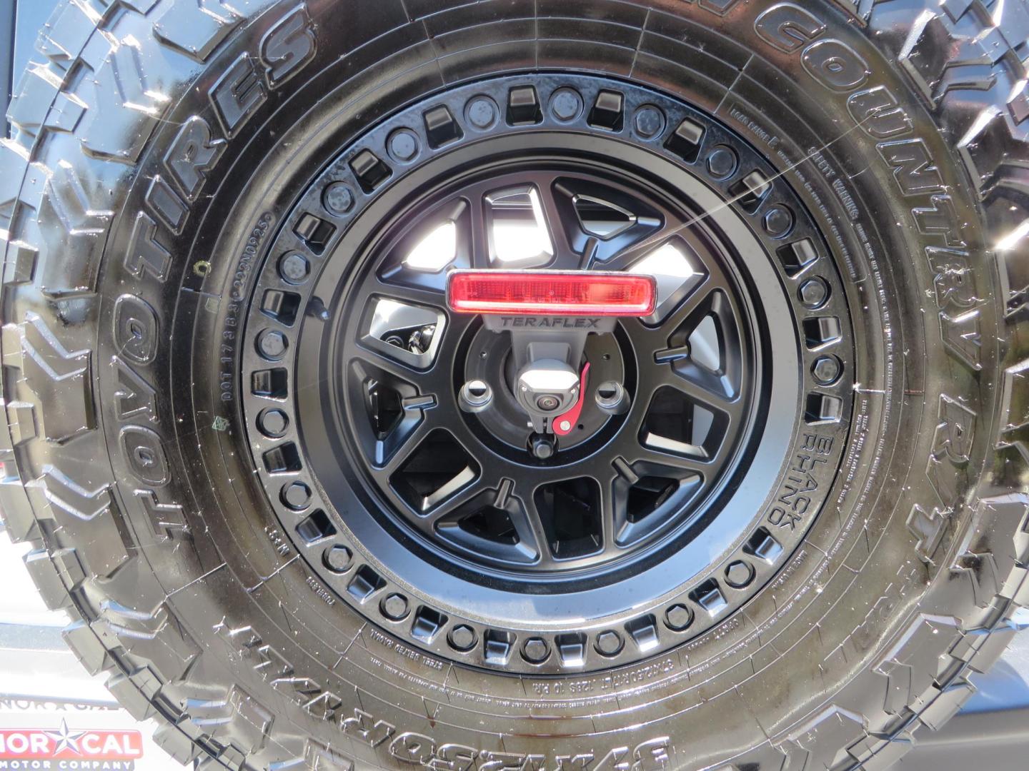 2021 White /Black Jeep Wrangler Unlimited Rubicon 4XE (1C4JJXR64MW) with an 2.0L L4 DOHC 16V HYBRID engine, 8A transmission, located at 2630 Grass Valley Highway, Auburn, CA, 95603, (530) 508-5100, 38.937893, -121.095482 - Mopar lifted JL with 17" Black Rhino Kelso wheels, 37" Toyo RT Trail tires, and a Teraflex HD tire relocation. - Photo#15