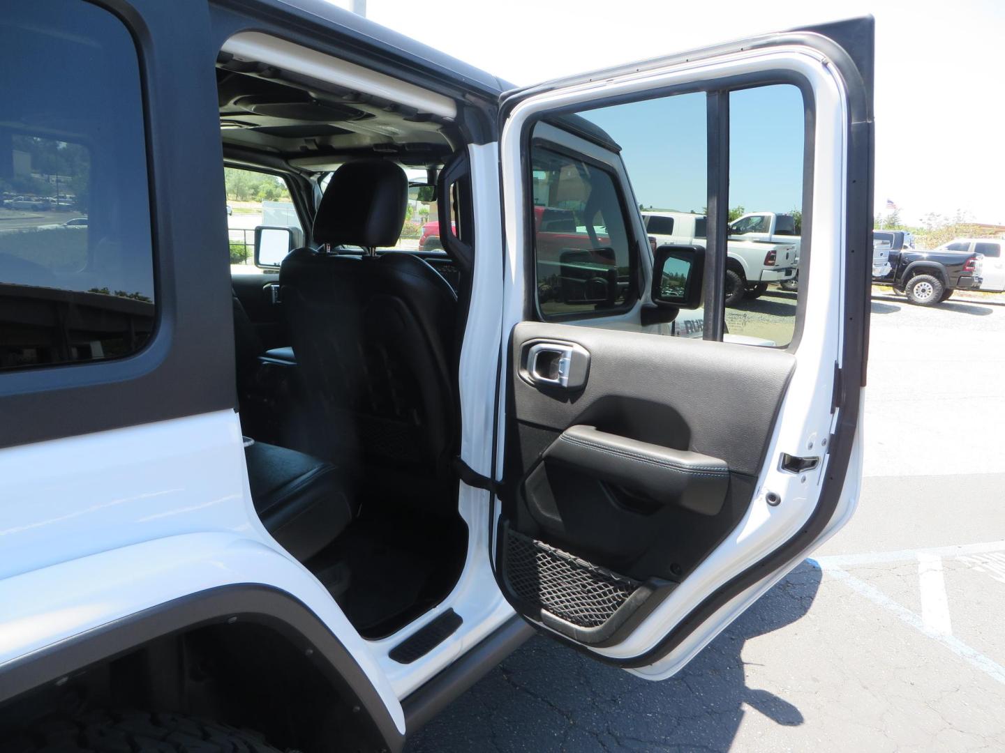 2021 White /Black Jeep Wrangler Unlimited Rubicon 4XE (1C4JJXR64MW) with an 2.0L L4 DOHC 16V HYBRID engine, 8A transmission, located at 2630 Grass Valley Highway, Auburn, CA, 95603, (530) 508-5100, 38.937893, -121.095482 - Mopar lifted JL with 17" Black Rhino Kelso wheels, 37" Toyo RT Trail tires, and a Teraflex HD tire relocation. - Photo#57