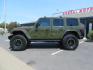 2021 Green Jeep Wrangler Unlimited Rubicon (1C4JJXFM1MW) with an 3.0L V6 DOHC 24V TURBO DIESEL engine, 6A transmission, located at 2630 Grass Valley Highway, Auburn, CA, 95603, (530) 508-5100, 38.937893, -121.095482 - Mopar lifted Diesel Rubicon with Fox shocks, HD tire carrier, Amp Power steps, Roof Rack, and color matched simulated beadlock rings. - Photo#1