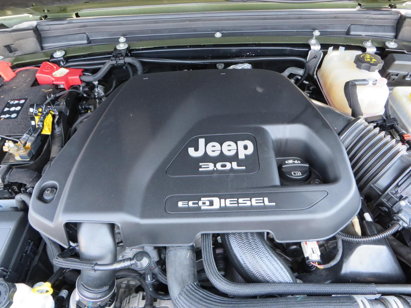 2021 Green Jeep Wrangler Unlimited Rubicon (1C4JJXFM1MW) with an 3.0L V6 DOHC 24V TURBO DIESEL engine, 6A transmission, located at 2630 Grass Valley Highway, Auburn, CA, 95603, (530) 508-5100, 38.937893, -121.095482 - Mopar lifted Diesel Rubicon with Fox shocks, HD tire carrier, Amp Power steps, Roof Rack, and color matched simulated beadlock rings. - Photo#69