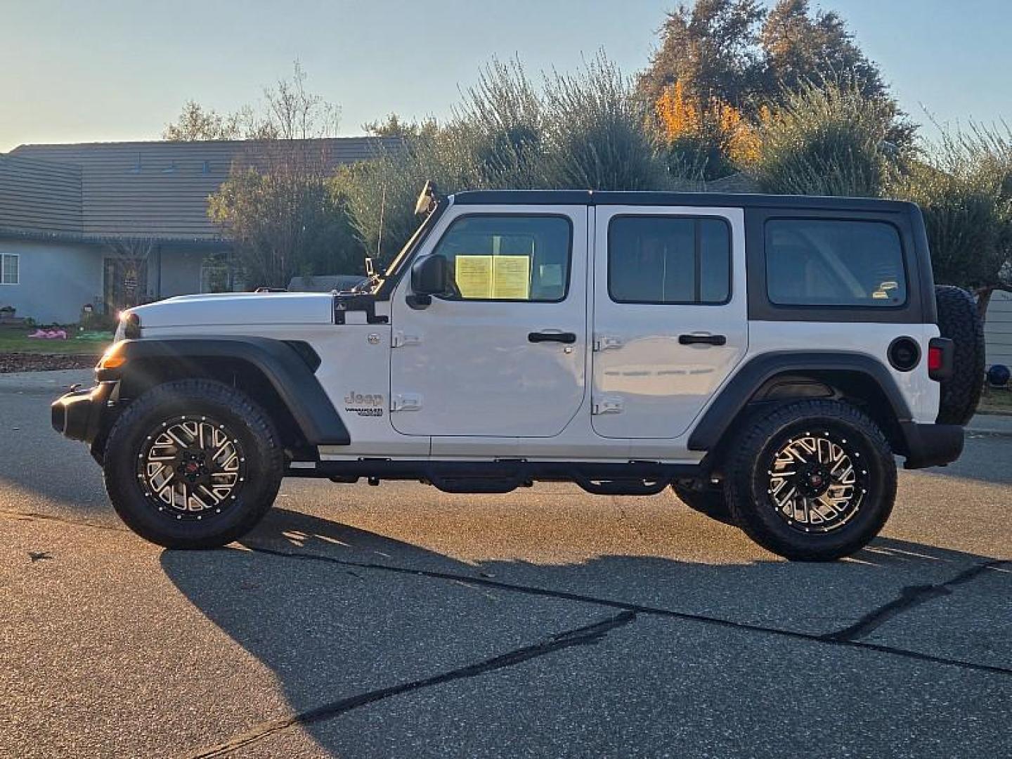 2021 WHITE Jeep Wrangler Unlimited (1C4HJXDN7MW) with an 4-Cyl Turbo 2.0 Liter engine, located at 246 E Walker St., Orland, 95963, (530) 865-5800, 39.747589, -122.178398 - Photo#4