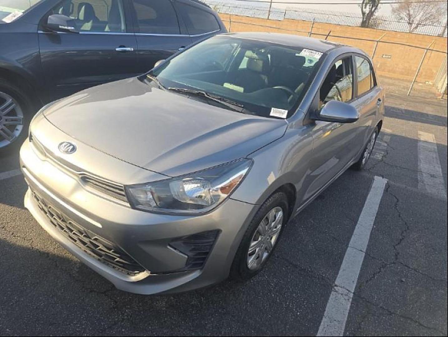 2021 GRAY Kia Rio 5-Door (3KPA25AD1ME) with an 4-Cyl 1.6 Liter engine, Automatic IVT transmission, located at 412 Auto Vista Drive, Palmdale, 93551, (661) 945-0620, 34.592636, -118.136681- Photo#0