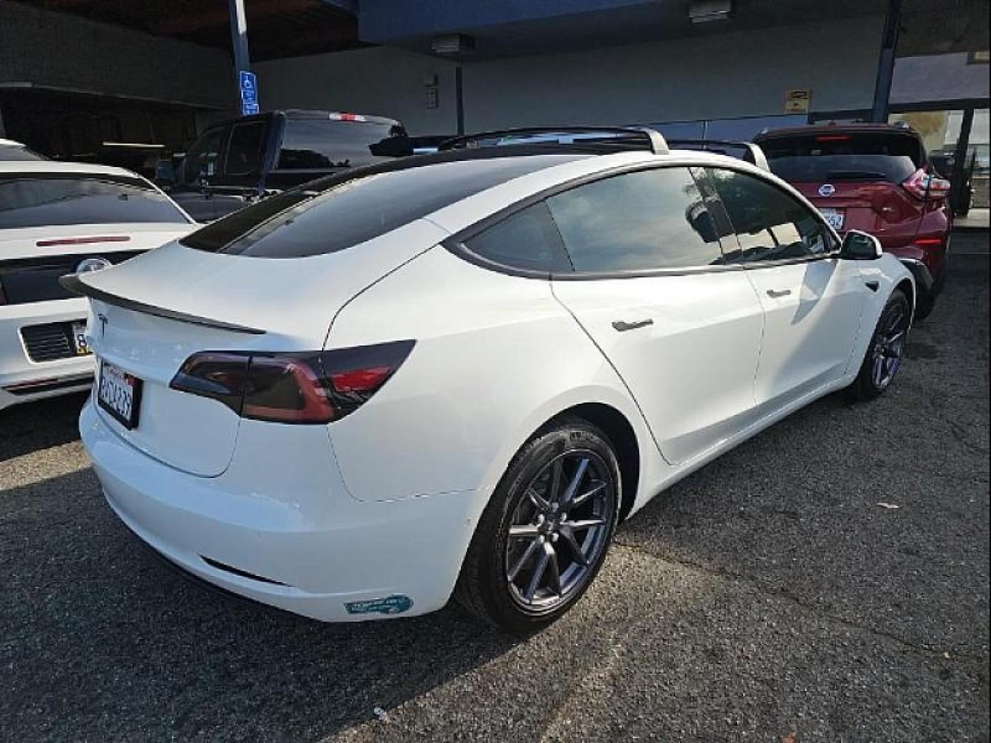 2021 WHITE Tesla Model 3 (5YJ3E1EA9MF) with an AC Electric Motor engine, Single-Speed Fixed Gear transmission, located at 412 Auto Vista Drive, Palmdale, 93551, (661) 945-0620, 34.592636, -118.136681 - Photo#4