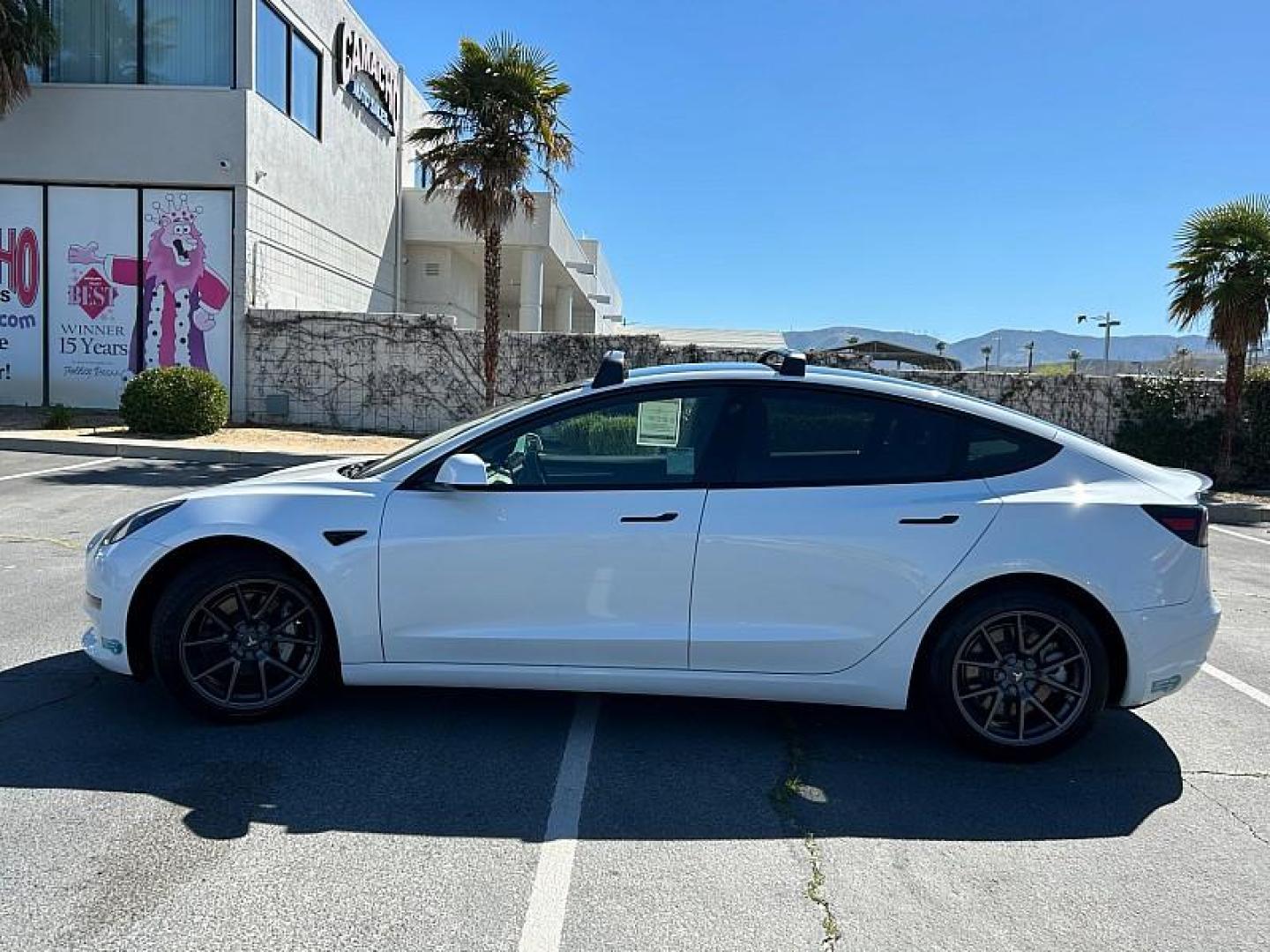 2021 WHITE Tesla Model 3 (5YJ3E1EA9MF) with an AC Electric Motor engine, Single-Speed Fixed Gear transmission, located at 412 Auto Vista Drive, Palmdale, 93551, (661) 945-0620, 34.592636, -118.136681 - Photo#14