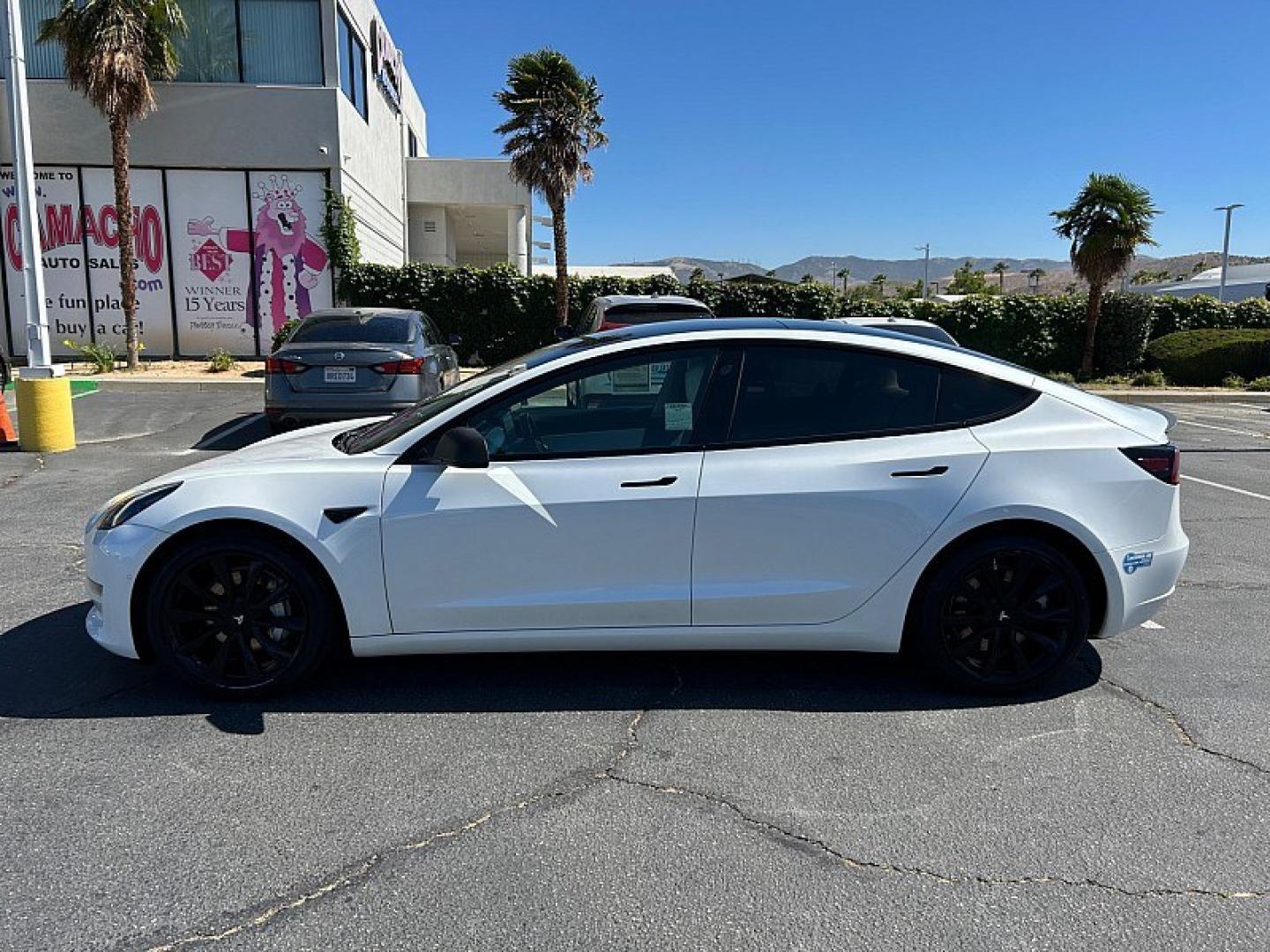 2021 White Tesla Model 3 (5YJ3E1EB6MF) with an Dual Electric Motors engine, Single-Speed Fixed Gear transmission, located at 412 Auto Vista Drive, Palmdale, 93551, (661) 945-0620, 34.592636, -118.136681- Photo#3
