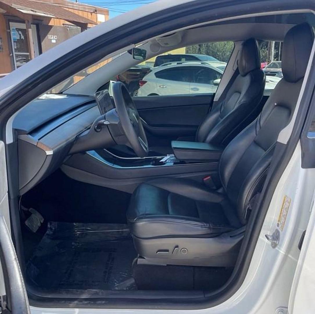 2021 WHITE Tesla Model Y (5YJYGDEE2MF) with an Dual AC Electric Motors engine, Single-Speed Fixed Gear transmission, located at 412 Auto Vista Drive, Palmdale, 93551, (661) 945-0620, 34.592636, -118.136681 - Photo#0