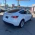 2021 WHITE Tesla Model Y (5YJYGDEEXMF) with an Dual AC Electric Motors engine, Single-Speed Fixed Gear transmission, located at 412 Auto Vista Drive, Palmdale, 93551, (661) 945-0620, 34.592636, -118.136681 - Photo#2