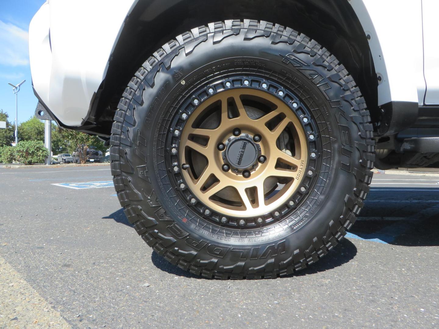 2021 White Toyota 4Runner TRD Off-road Premium 4WD (JTERU5JR5M5) with an 4.0L V6 DOHC 24V engine, 5A transmission, located at 2630 Grass Valley Highway, Auburn, CA, 95603, (530) 508-5100, 38.937893, -121.095482 - TRD Offroad Premium 4Runner ready for all of your adventures. Features Ironman suspension, 285 Falken Wildpeak AT3W tires, 17" Method Race wheels, Front winch bumper, Badlands winch, Led bumper and ditch lights, and rear cargo molle panels. - Photo#8