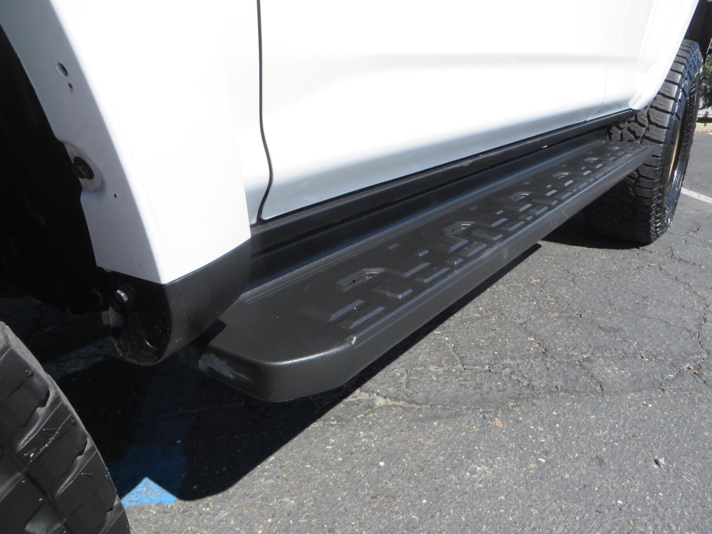 2021 White Toyota 4Runner TRD Off-road Premium 4WD (JTERU5JR5M5) with an 4.0L V6 DOHC 24V engine, 5A transmission, located at 2630 Grass Valley Highway, Auburn, CA, 95603, (530) 508-5100, 38.937893, -121.095482 - TRD Offroad Premium 4Runner ready for all of your adventures. Features Ironman suspension, 285 Falken Wildpeak AT3W tires, 17" Method Race wheels, Front winch bumper, Badlands winch, Led bumper and ditch lights, and rear cargo molle panels. - Photo#11