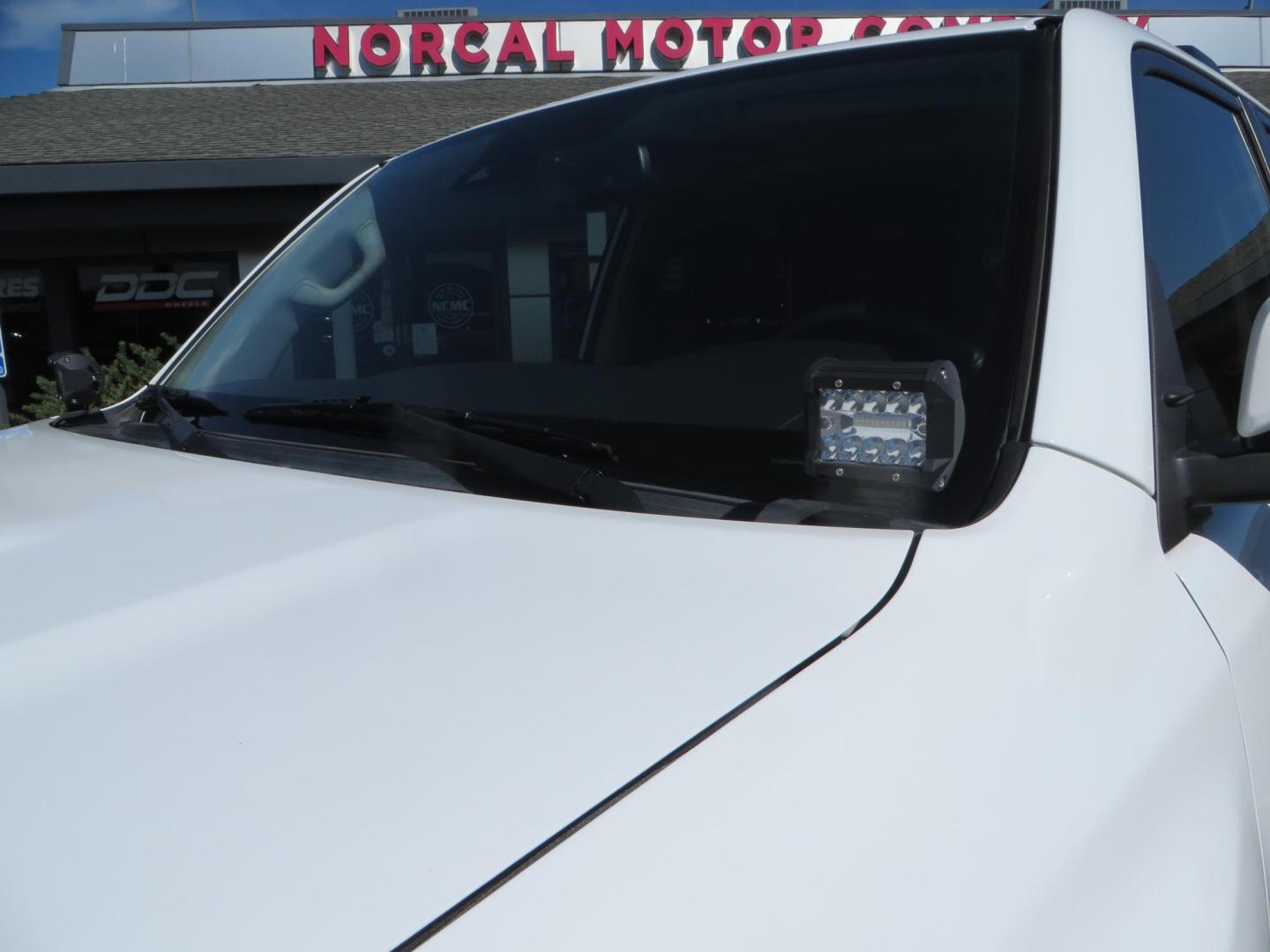 2021 White Toyota 4Runner TRD Off-road Premium 4WD (JTERU5JR5M5) with an 4.0L V6 DOHC 24V engine, 5A transmission, located at 2630 Grass Valley Highway, Auburn, CA, 95603, (530) 508-5100, 38.937893, -121.095482 - TRD Offroad Premium 4Runner ready for all of your adventures. Features Ironman suspension, 285 Falken Wildpeak AT3W tires, 17" Method Race wheels, Front winch bumper, Badlands winch, Led bumper and ditch lights, and rear cargo molle panels. - Photo#13