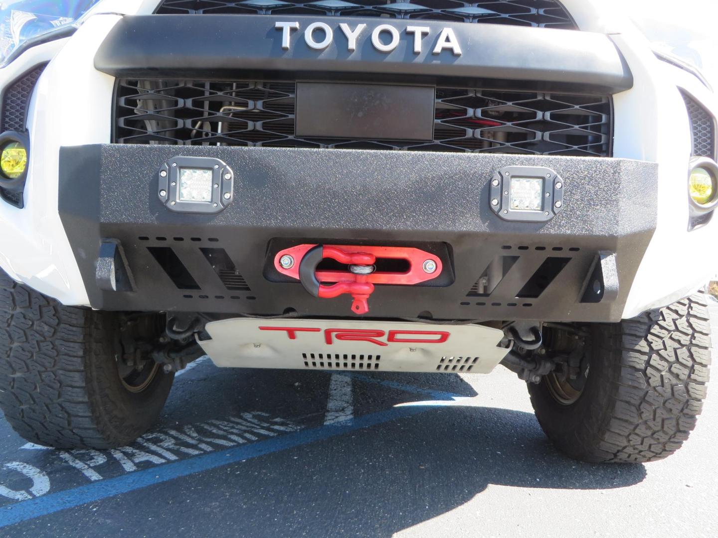 2021 White Toyota 4Runner TRD Off-road Premium 4WD (JTERU5JR5M5) with an 4.0L V6 DOHC 24V engine, 5A transmission, located at 2630 Grass Valley Highway, Auburn, CA, 95603, (530) 508-5100, 38.937893, -121.095482 - TRD Offroad Premium 4Runner ready for all of your adventures. Features Ironman suspension, 285 Falken Wildpeak AT3W tires, 17" Method Race wheels, Front winch bumper, Badlands winch, Led bumper and ditch lights, and rear cargo molle panels. - Photo#14