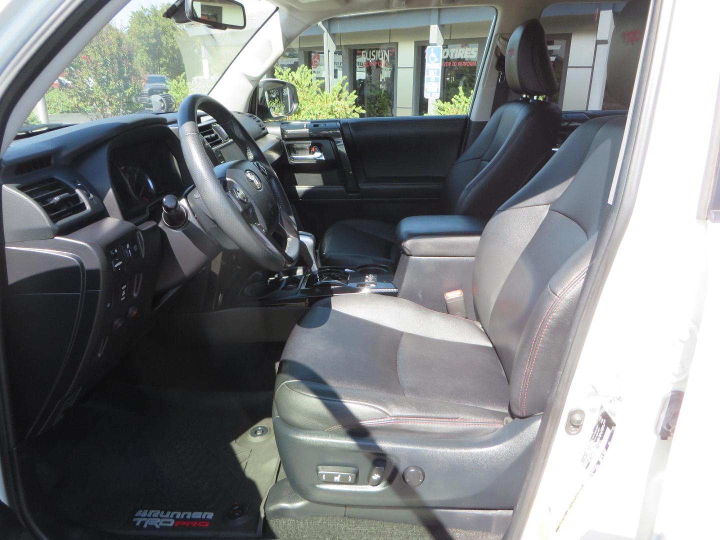 2021 White Toyota 4Runner TRD Off-road Premium 4WD (JTERU5JR5M5) with an 4.0L V6 DOHC 24V engine, 5A transmission, located at 2630 Grass Valley Highway, Auburn, CA, 95603, (530) 508-5100, 38.937893, -121.095482 - TRD Offroad Premium 4Runner ready for all of your adventures. Features Ironman suspension, 285 Falken Wildpeak AT3W tires, 17" Method Race wheels, Front winch bumper, Badlands winch, Led bumper and ditch lights, and rear cargo molle panels. - Photo#19