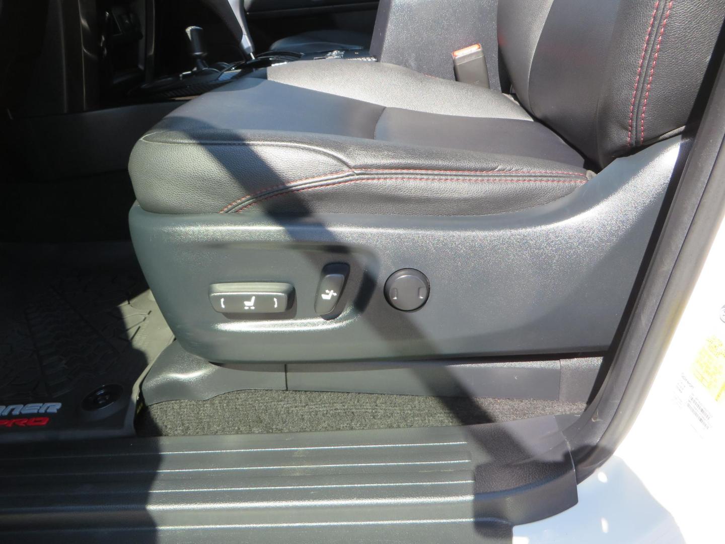 2021 White Toyota 4Runner TRD Off-road Premium 4WD (JTERU5JR5M5) with an 4.0L V6 DOHC 24V engine, 5A transmission, located at 2630 Grass Valley Highway, Auburn, CA, 95603, (530) 508-5100, 38.937893, -121.095482 - TRD Offroad Premium 4Runner ready for all of your adventures. Features Ironman suspension, 285 Falken Wildpeak AT3W tires, 17" Method Race wheels, Front winch bumper, Badlands winch, Led bumper and ditch lights, and rear cargo molle panels. - Photo#22