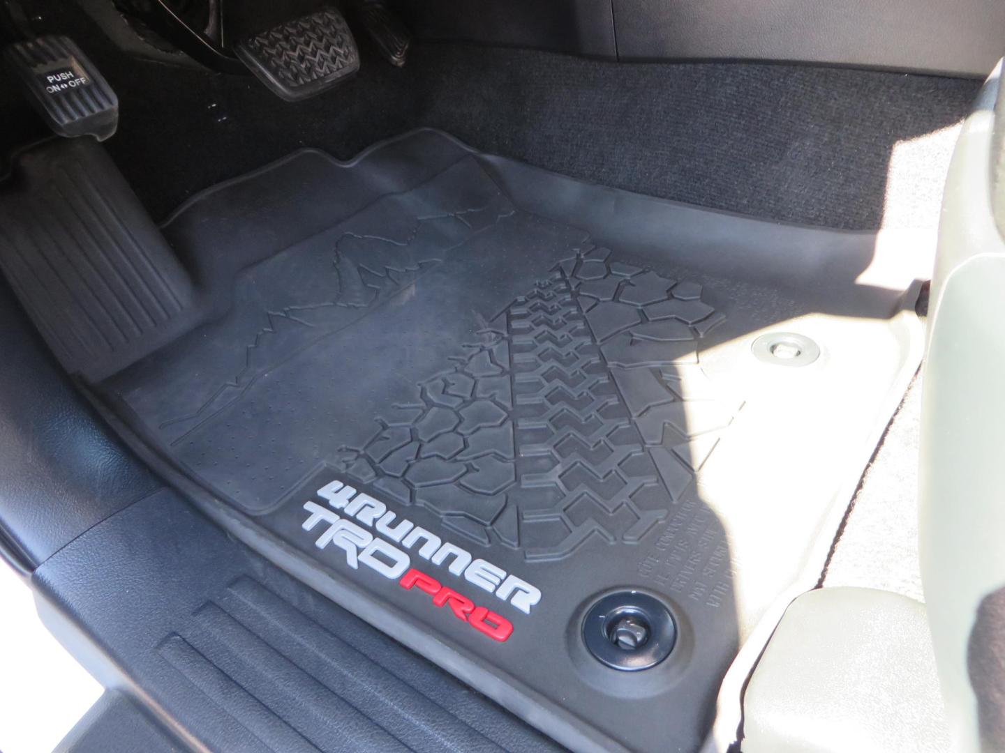 2021 White Toyota 4Runner TRD Off-road Premium 4WD (JTERU5JR5M5) with an 4.0L V6 DOHC 24V engine, 5A transmission, located at 2630 Grass Valley Highway, Auburn, CA, 95603, (530) 508-5100, 38.937893, -121.095482 - TRD Offroad Premium 4Runner ready for all of your adventures. Features Ironman suspension, 285 Falken Wildpeak AT3W tires, 17" Method Race wheels, Front winch bumper, Badlands winch, Led bumper and ditch lights, and rear cargo molle panels. - Photo#23