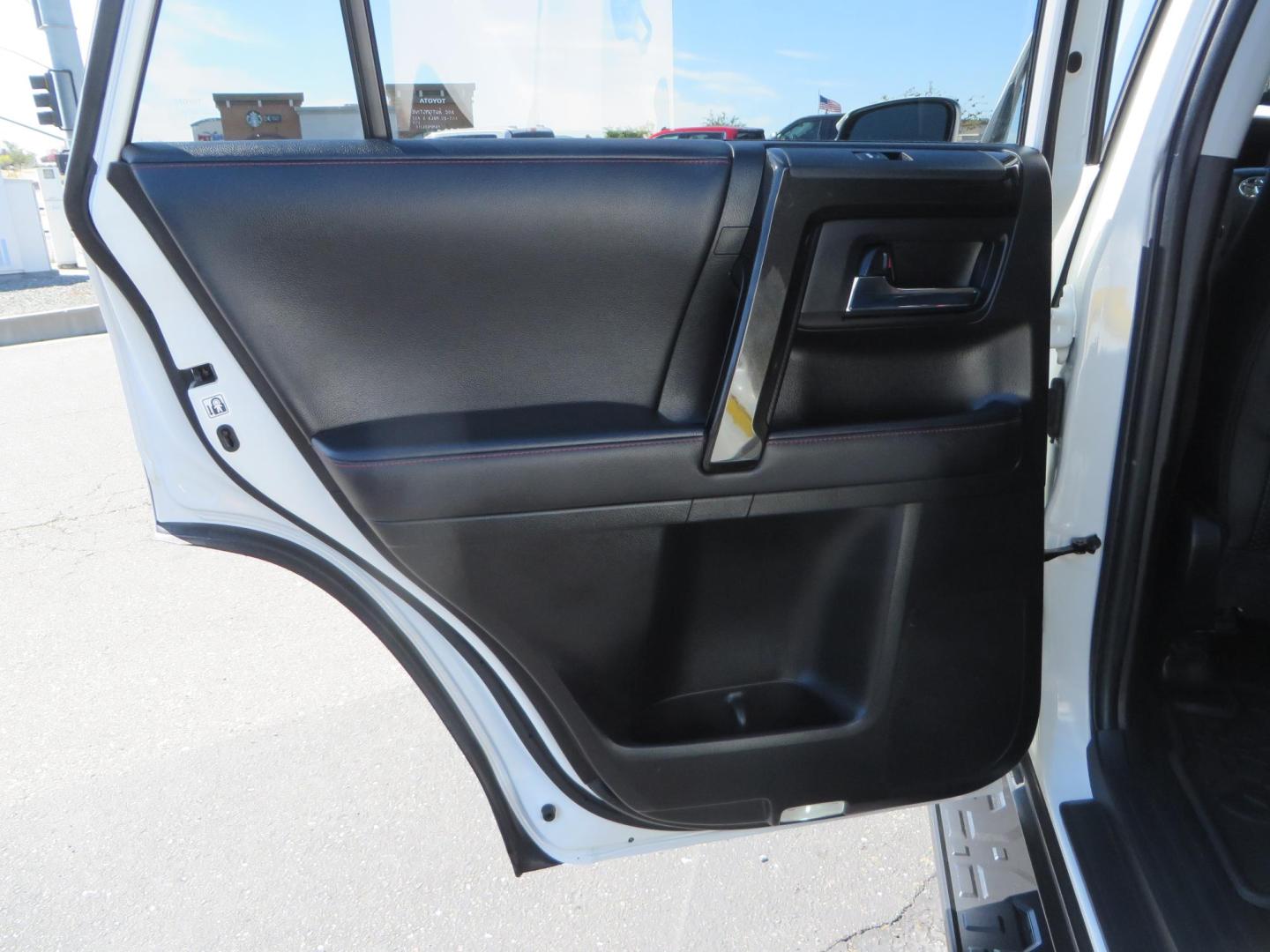 2021 White Toyota 4Runner TRD Off-road Premium 4WD (JTERU5JR5M5) with an 4.0L V6 DOHC 24V engine, 5A transmission, located at 2630 Grass Valley Highway, Auburn, CA, 95603, (530) 508-5100, 38.937893, -121.095482 - TRD Offroad Premium 4Runner ready for all of your adventures. Features Ironman suspension, 285 Falken Wildpeak AT3W tires, 17" Method Race wheels, Front winch bumper, Badlands winch, Led bumper and ditch lights, and rear cargo molle panels. - Photo#41