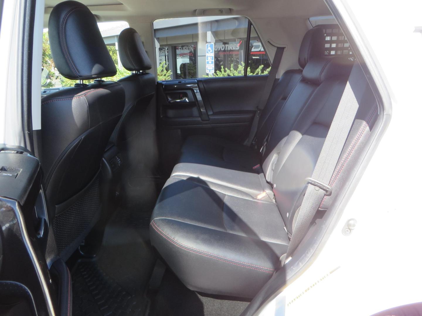 2021 White Toyota 4Runner TRD Off-road Premium 4WD (JTERU5JR5M5) with an 4.0L V6 DOHC 24V engine, 5A transmission, located at 2630 Grass Valley Highway, Auburn, CA, 95603, (530) 508-5100, 38.937893, -121.095482 - TRD Offroad Premium 4Runner ready for all of your adventures. Features Ironman suspension, 285 Falken Wildpeak AT3W tires, 17" Method Race wheels, Front winch bumper, Badlands winch, Led bumper and ditch lights, and rear cargo molle panels. - Photo#43