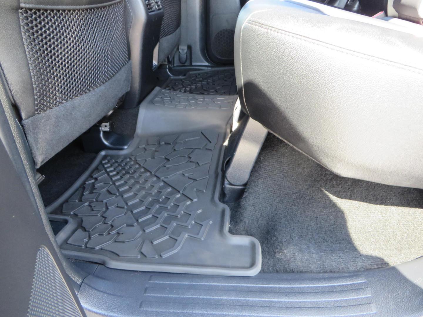 2021 White Toyota 4Runner TRD Off-road Premium 4WD (JTERU5JR5M5) with an 4.0L V6 DOHC 24V engine, 5A transmission, located at 2630 Grass Valley Highway, Auburn, CA, 95603, (530) 508-5100, 38.937893, -121.095482 - TRD Offroad Premium 4Runner ready for all of your adventures. Features Ironman suspension, 285 Falken Wildpeak AT3W tires, 17" Method Race wheels, Front winch bumper, Badlands winch, Led bumper and ditch lights, and rear cargo molle panels. - Photo#45