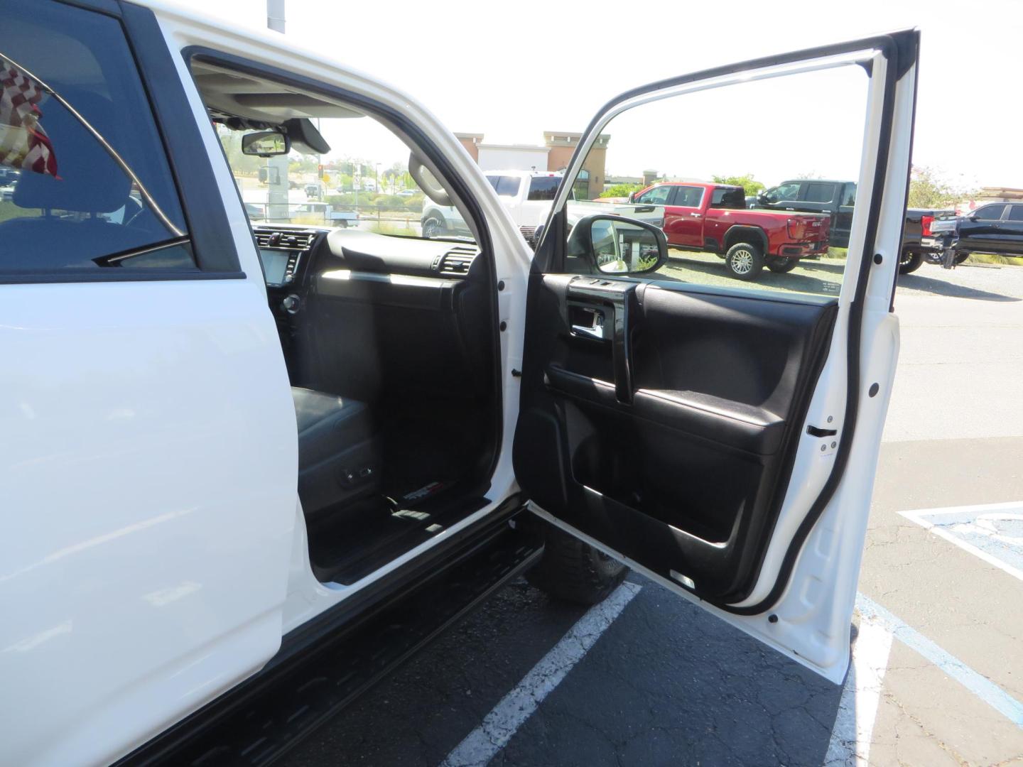 2021 White Toyota 4Runner TRD Off-road Premium 4WD (JTERU5JR5M5) with an 4.0L V6 DOHC 24V engine, 5A transmission, located at 2630 Grass Valley Highway, Auburn, CA, 95603, (530) 508-5100, 38.937893, -121.095482 - TRD Offroad Premium 4Runner ready for all of your adventures. Features Ironman suspension, 285 Falken Wildpeak AT3W tires, 17" Method Race wheels, Front winch bumper, Badlands winch, Led bumper and ditch lights, and rear cargo molle panels. - Photo#48