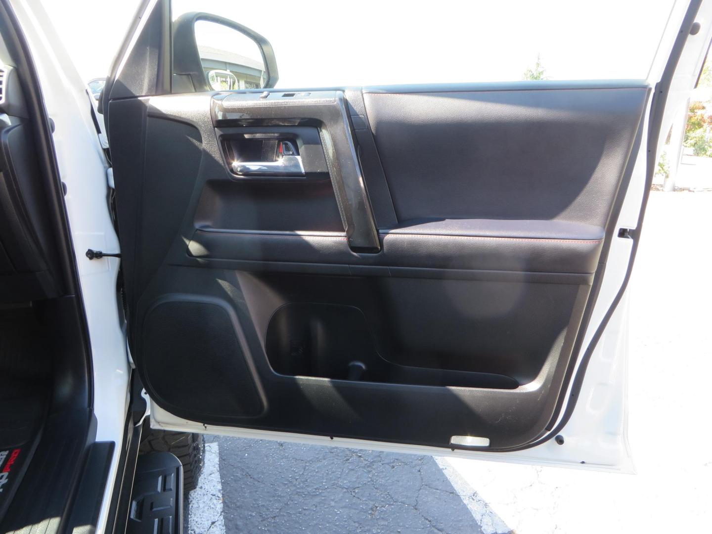 2021 White Toyota 4Runner TRD Off-road Premium 4WD (JTERU5JR5M5) with an 4.0L V6 DOHC 24V engine, 5A transmission, located at 2630 Grass Valley Highway, Auburn, CA, 95603, (530) 508-5100, 38.937893, -121.095482 - TRD Offroad Premium 4Runner ready for all of your adventures. Features Ironman suspension, 285 Falken Wildpeak AT3W tires, 17" Method Race wheels, Front winch bumper, Badlands winch, Led bumper and ditch lights, and rear cargo molle panels. - Photo#49