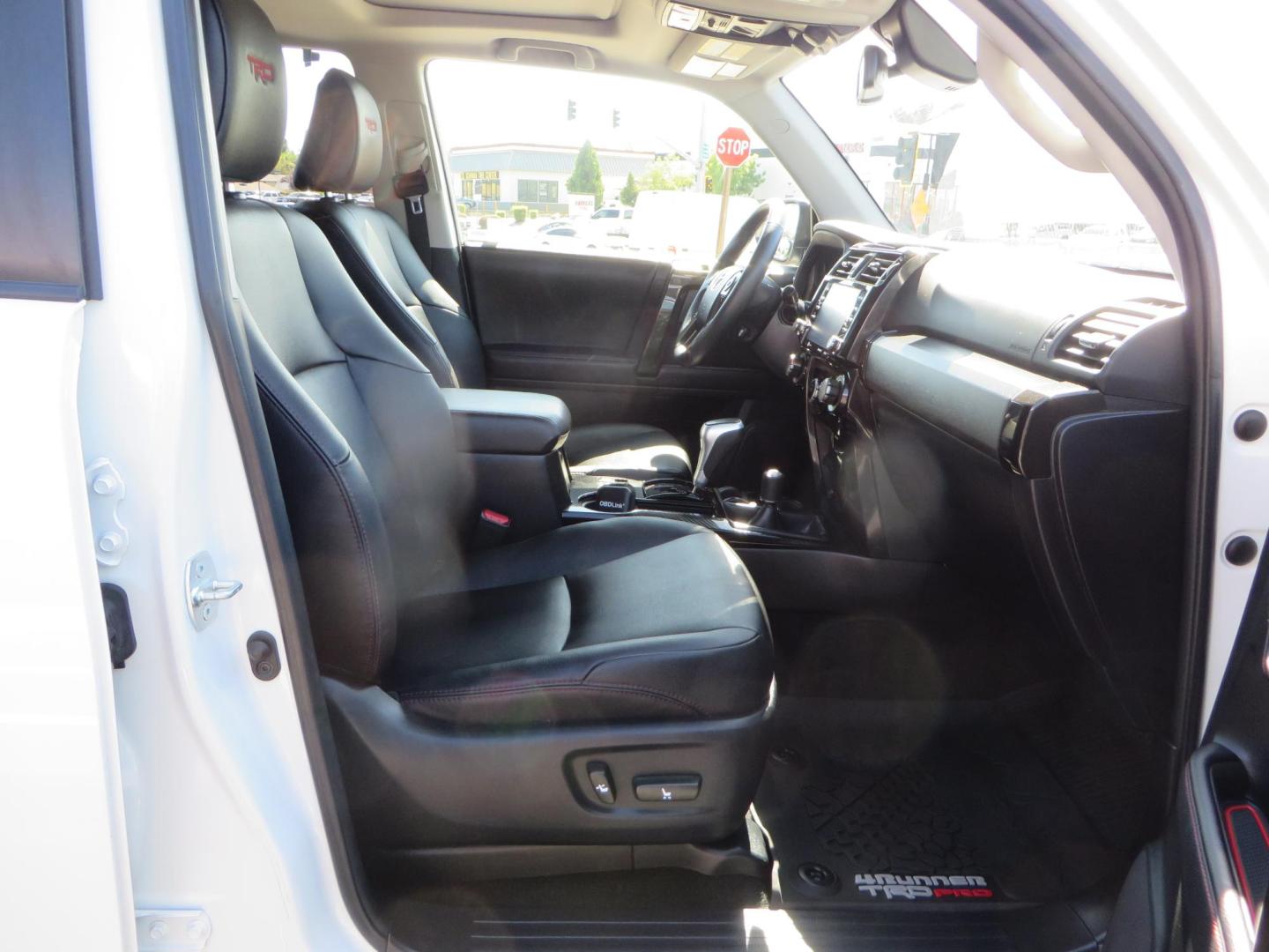 2021 White Toyota 4Runner TRD Off-road Premium 4WD (JTERU5JR5M5) with an 4.0L V6 DOHC 24V engine, 5A transmission, located at 2630 Grass Valley Highway, Auburn, CA, 95603, (530) 508-5100, 38.937893, -121.095482 - TRD Offroad Premium 4Runner ready for all of your adventures. Features Ironman suspension, 285 Falken Wildpeak AT3W tires, 17" Method Race wheels, Front winch bumper, Badlands winch, Led bumper and ditch lights, and rear cargo molle panels. - Photo#51