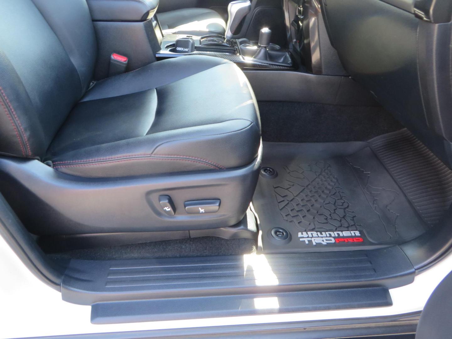 2021 White Toyota 4Runner TRD Off-road Premium 4WD (JTERU5JR5M5) with an 4.0L V6 DOHC 24V engine, 5A transmission, located at 2630 Grass Valley Highway, Auburn, CA, 95603, (530) 508-5100, 38.937893, -121.095482 - TRD Offroad Premium 4Runner ready for all of your adventures. Features Ironman suspension, 285 Falken Wildpeak AT3W tires, 17" Method Race wheels, Front winch bumper, Badlands winch, Led bumper and ditch lights, and rear cargo molle panels. - Photo#53