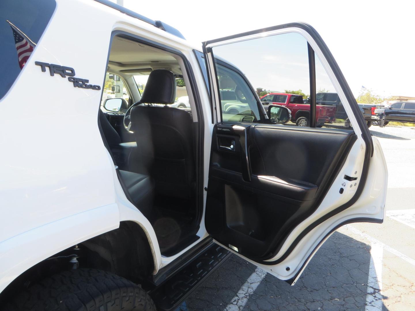 2021 White Toyota 4Runner TRD Off-road Premium 4WD (JTERU5JR5M5) with an 4.0L V6 DOHC 24V engine, 5A transmission, located at 2630 Grass Valley Highway, Auburn, CA, 95603, (530) 508-5100, 38.937893, -121.095482 - TRD Offroad Premium 4Runner ready for all of your adventures. Features Ironman suspension, 285 Falken Wildpeak AT3W tires, 17" Method Race wheels, Front winch bumper, Badlands winch, Led bumper and ditch lights, and rear cargo molle panels. - Photo#55