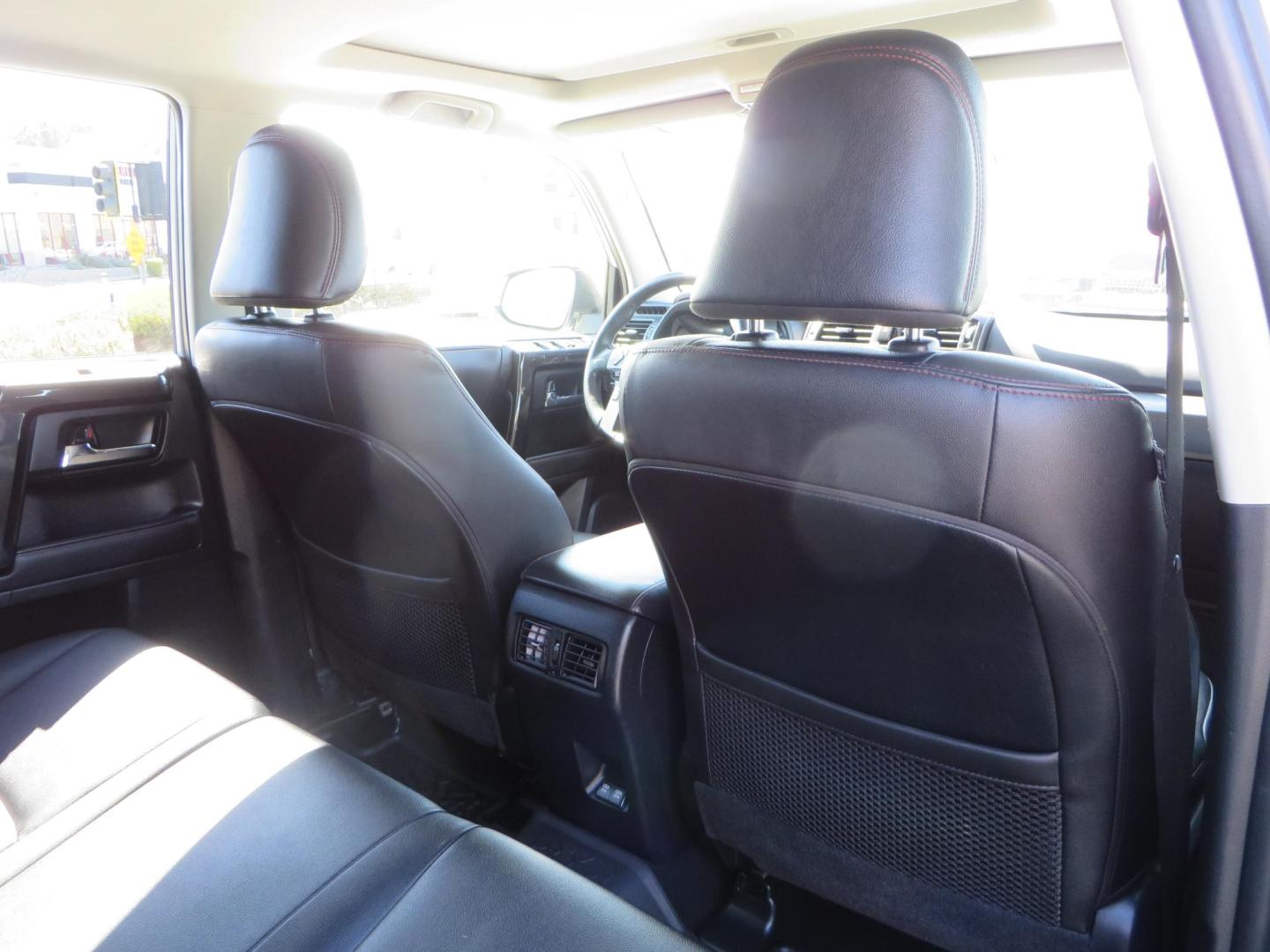 2021 White Toyota 4Runner TRD Off-road Premium 4WD (JTERU5JR5M5) with an 4.0L V6 DOHC 24V engine, 5A transmission, located at 2630 Grass Valley Highway, Auburn, CA, 95603, (530) 508-5100, 38.937893, -121.095482 - TRD Offroad Premium 4Runner ready for all of your adventures. Features Ironman suspension, 285 Falken Wildpeak AT3W tires, 17" Method Race wheels, Front winch bumper, Badlands winch, Led bumper and ditch lights, and rear cargo molle panels. - Photo#61