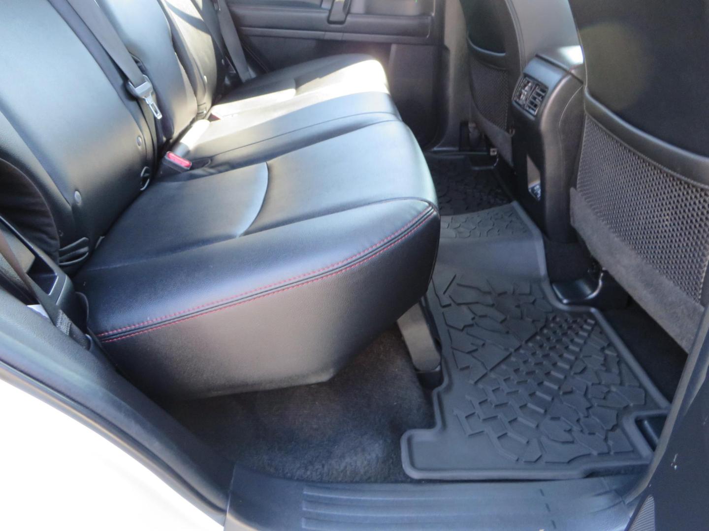 2021 White Toyota 4Runner TRD Off-road Premium 4WD (JTERU5JR5M5) with an 4.0L V6 DOHC 24V engine, 5A transmission, located at 2630 Grass Valley Highway, Auburn, CA, 95603, (530) 508-5100, 38.937893, -121.095482 - TRD Offroad Premium 4Runner ready for all of your adventures. Features Ironman suspension, 285 Falken Wildpeak AT3W tires, 17" Method Race wheels, Front winch bumper, Badlands winch, Led bumper and ditch lights, and rear cargo molle panels. - Photo#60