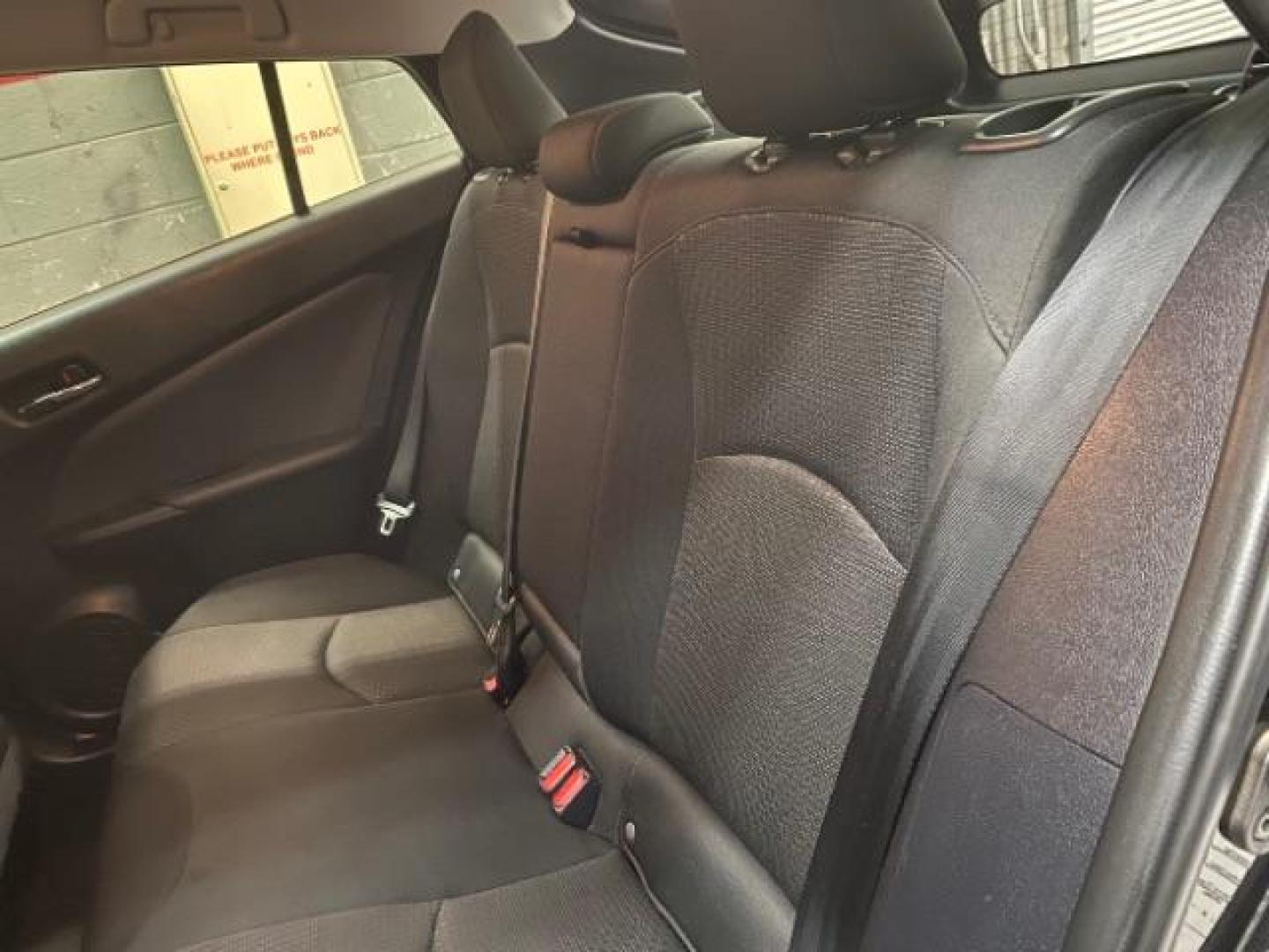 2021 BLACK Toyota Prius (JTDKAMFU1M3) with an 4-Cyl Hybrid 1.8 Liter engine, Automatic ECVT transmission, located at 412 Auto Vista Drive, Palmdale, 93551, (661) 945-0620, 34.592636, -118.136681 - Photo#22