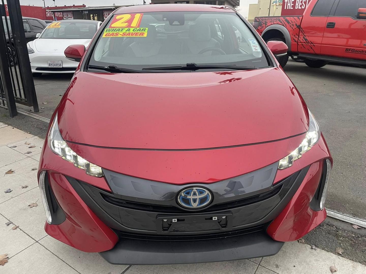 2021 Toyota Prius Prime LE (JTDKAMFPXM3) with an 1.8L L4 DOHC 16V HYBRID engine, CVT transmission, located at 744 E Miner Ave, Stockton, CA, 95202, (209) 944-5770, 37.956863, -121.282082 - PLUS TAXES AND FEES - Photo#2