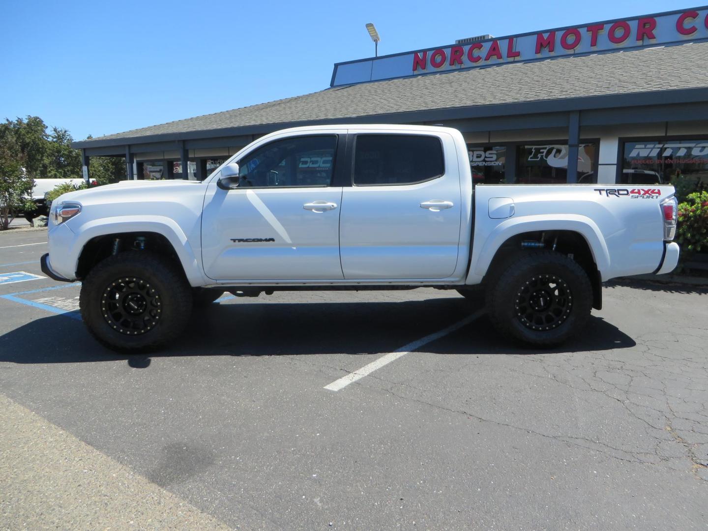 2021 Toyota Tacoma TRD Sport Double Cab Long Bed V6 6AT 4WD (3TYCZ5AN5MT) with an 3.5L V6 DOHC 24V engine, 6A transmission, located at 2630 Grass Valley Highway, Auburn, CA, 95603, (530) 508-5100, 38.937893, -121.095482 - KING REMOTE RESERVOIR COILOVERS and REAR SHOCKS, CAMBURG UPPER CONTROL ARMS, METHOD NV WHEELS, NITTO TERRA GRAPPLER TIRES, ROCK SLIDE ENGINEERING FRONT CUT OUT BUMPER - Photo#1