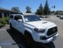 2021 White Toyota Tacoma SR5 Double Cab V6 6AT 4WD (3TMCZ5AN1MM) with an 3.5L V6 DOHC 24V engine, 6A transmission, located at 2630 Grass Valley Highway, Auburn, CA, 95603, (530) 508-5100, 38.937893, -121.095482 - Icon Vehicle Dynamics remote reservoir coilovers and shocks, Icon Upper control arms, 1552 wheels, Toyo AT3 tires, Rock Sliders, Victory 4x4 roof and camper shell rack, Leer Camper shell, Banks Idash. - Photo#4