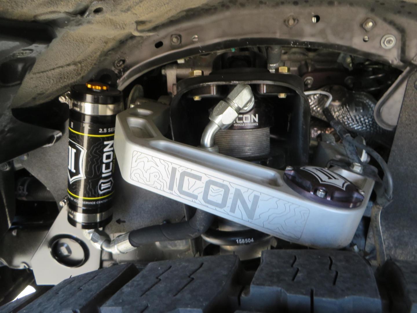 2021 White Toyota Tacoma SR5 Double Cab V6 6AT 4WD (3TMCZ5AN1MM) with an 3.5L V6 DOHC 24V engine, 6A transmission, located at 2630 Grass Valley Highway, Auburn, CA, 95603, (530) 508-5100, 38.937893, -121.095482 - Icon Vehicle Dynamics remote reservoir coilovers and shocks, Icon Upper control arms, 1552 wheels, Toyo AT3 tires, Rock Sliders, Victory 4x4 roof and camper shell rack, Leer Camper shell, Banks Idash. - Photo#19