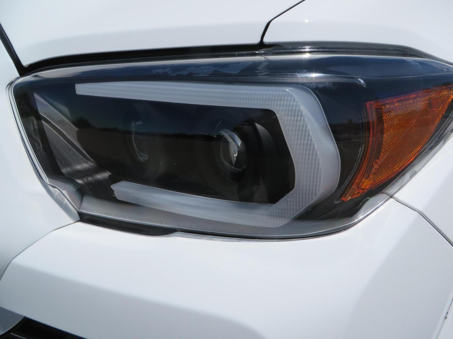 2021 White Toyota Tacoma SR5 Double Cab V6 6AT 4WD (3TMCZ5AN1MM) with an 3.5L V6 DOHC 24V engine, 6A transmission, located at 2630 Grass Valley Highway, Auburn, CA, 95603, (530) 508-5100, 38.937893, -121.095482 - Icon Vehicle Dynamics remote reservoir coilovers and shocks, Icon Upper control arms, 1552 wheels, Toyo AT3 tires, Rock Sliders, Victory 4x4 roof and camper shell rack, Leer Camper shell, Banks Idash. - Photo#21