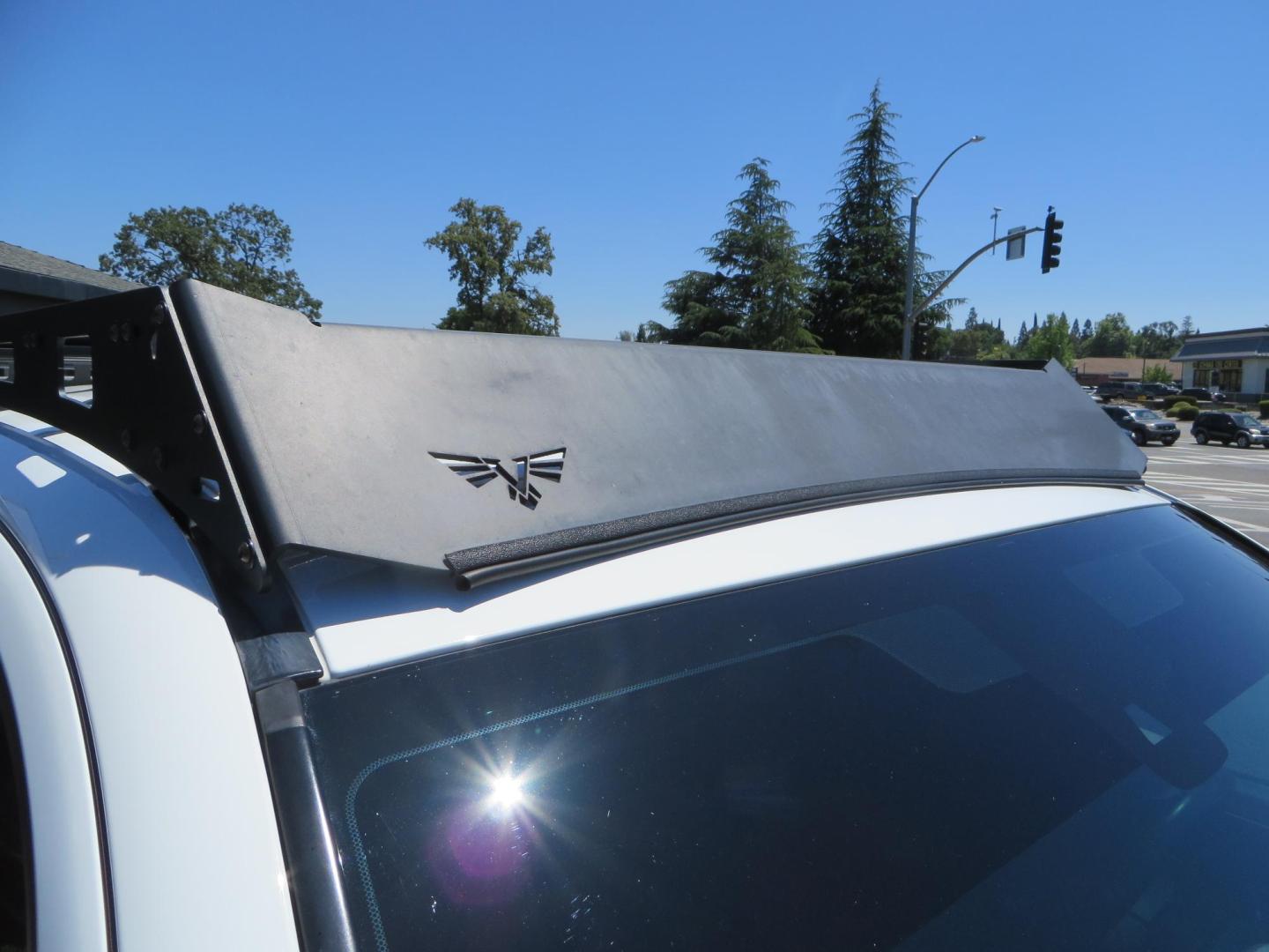 2021 White Toyota Tacoma SR5 Double Cab V6 6AT 4WD (3TMCZ5AN1MM) with an 3.5L V6 DOHC 24V engine, 6A transmission, located at 2630 Grass Valley Highway, Auburn, CA, 95603, (530) 508-5100, 38.937893, -121.095482 - Icon Vehicle Dynamics remote reservoir coilovers and shocks, Icon Upper control arms, 1552 wheels, Toyo AT3 tires, Rock Sliders, Victory 4x4 roof and camper shell rack, Leer Camper shell, Banks Idash. - Photo#26