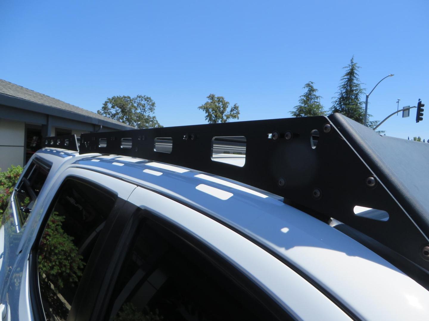 2021 White Toyota Tacoma SR5 Double Cab V6 6AT 4WD (3TMCZ5AN1MM) with an 3.5L V6 DOHC 24V engine, 6A transmission, located at 2630 Grass Valley Highway, Auburn, CA, 95603, (530) 508-5100, 38.937893, -121.095482 - Icon Vehicle Dynamics remote reservoir coilovers and shocks, Icon Upper control arms, 1552 wheels, Toyo AT3 tires, Rock Sliders, Victory 4x4 roof and camper shell rack, Leer Camper shell, Banks Idash. - Photo#27